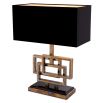 A luxury lamp by Eichholtz with a vintage brass finish