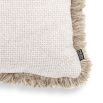Delicate and inviting cushion with neutral colours and fringe