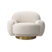 A curvy swivel chair by Eichholtz with a bouclé cream upholstery and brushed brass base 
