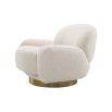 A curvy swivel chair by Eichholtz with a bouclé cream upholstery and brushed brass base 