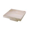 A luxury, square coffee table by Eichholtz crafted from travertine 