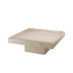 A luxury, square coffee table by Eichholtz crafted from travertine 