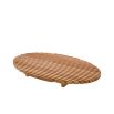A sophisticated and slatted natural teak outdoor coffee table by Eichholtz