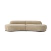 A glamorous and sculptural sofa with curves and a luxurious upholstery 