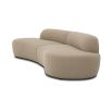 A glamorous and sculptural sofa with curves and a luxurious upholstery 