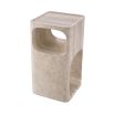 A sculptural side table by Eichholtz crafted from travertine with a Mid-Century appeal and multiple storage levels