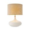 Beautiful table lamp with sweeping curves and natural linen shade with subtle embroidery