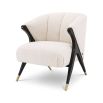 Striking and sumptuous armchair with y shaped frame and brass-capped feet