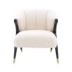 Striking and sumptuous armchair with y shaped frame and brass capped feet