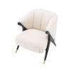 Striking and sumptuous armchair with y shaped frame and brass capped feet