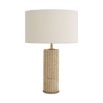 Decadent side lamp with travertine base and striking boucle shade