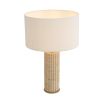 Decadent side lamp with travertine base and striking boucle shade