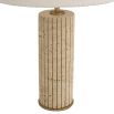 Decadent side lamp with travertine base and striking boucle shade