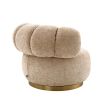 Dazzling swivel chair with brass base and sumptuous soft fabric