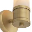 A glamourous wall lamp by Eichholtz with a cylindrical alabaster shade and brushed brass base