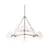 A stylish chandelier by Eichholtz with 10 spherical clear glass shades and a glamorous antique brass finish