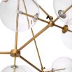 A stylish chandelier by Eichholtz with 10 spherical clear glass shades and a glamorous antique brass finish
