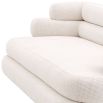 A contemporary and curvaceous sofa by Eichholtz with a luxury Lyssa Off-White upholstery