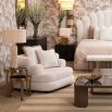 Luxurious armchair with sumptuous upholstery and rounded design