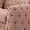 Luxurious pink sofa with classic style deep buttoning