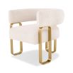 Glamorous design armchair with wrap-around backrest and rectangular brass legs