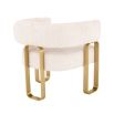 Glamorous design armchair with wrap-around backrest and rectangular brass legs