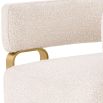 Glamorous design armchair with wrap-around backrest and rectangular brass legs