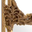 A hand-crafted French-style wall mirror by Eichholtz with an antique gold finish