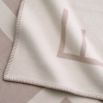 Greige and cream cashmere and wool throw with Eichholtz branding