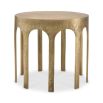 A striking side table by Eichholtz with arched details and a vintage brass finish