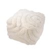 Cosy wool pouffe with elegant flowing curves