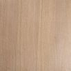 A natural oak veneer dining table by Eichholtz featuring subtle asymmetrical table legs