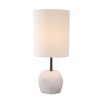 A luxury table lamp by Eichholtz carved from alabaster with an elongated boucle cylindrical shade