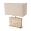 Striking, modern travertine table lamp with brass accents