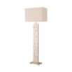 A modern and neutral floor lamp by Eichholtz with a boxy shape shade and travertine finish