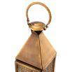 A luxury vintage brass hurricane by Eichholtz with a rattan finish