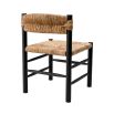 Stylish black frame dining chair with woven seat and backrest