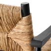 Bold black frame armchair with rustic woven backrest and seat