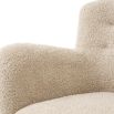 Cosy canberra sand upholstered sofa with sumptuous curves and deep stitching details