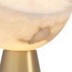 Captivating lamp with alabaster shade and brass plinth base