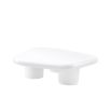 Bold and contemporary white coffee table with organically shaped surface