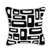 Glamorous embroidered cushion with mod-inspired print