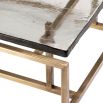 Square geometric coffee table with brass legs and glass top