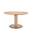 gorgeous round dining table with brass base