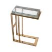 Sculptural brass side table with handmade glass top