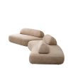 Luxuriously curvaceous sofa in soft lyssa sand upholstery