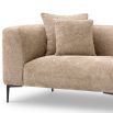 A luxury lounge sofa by Eichholtz with a Lyssa Sand finish 