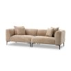 A luxury sofa by Eichholtz with a Lyssa sand upholstery and black legs