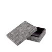Intricate square patterned black and white storage box
