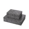 Intricate square patterned black and white storage box